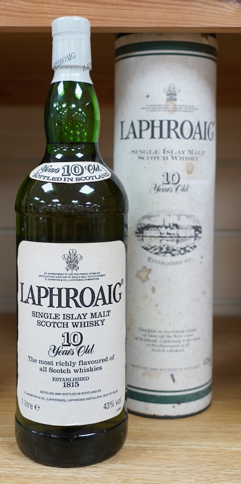 A cased 1lt bottle of Laphroaig Single Islay Malt Scotch Whisky, 10 Years Old. Condition - good, some staining to case